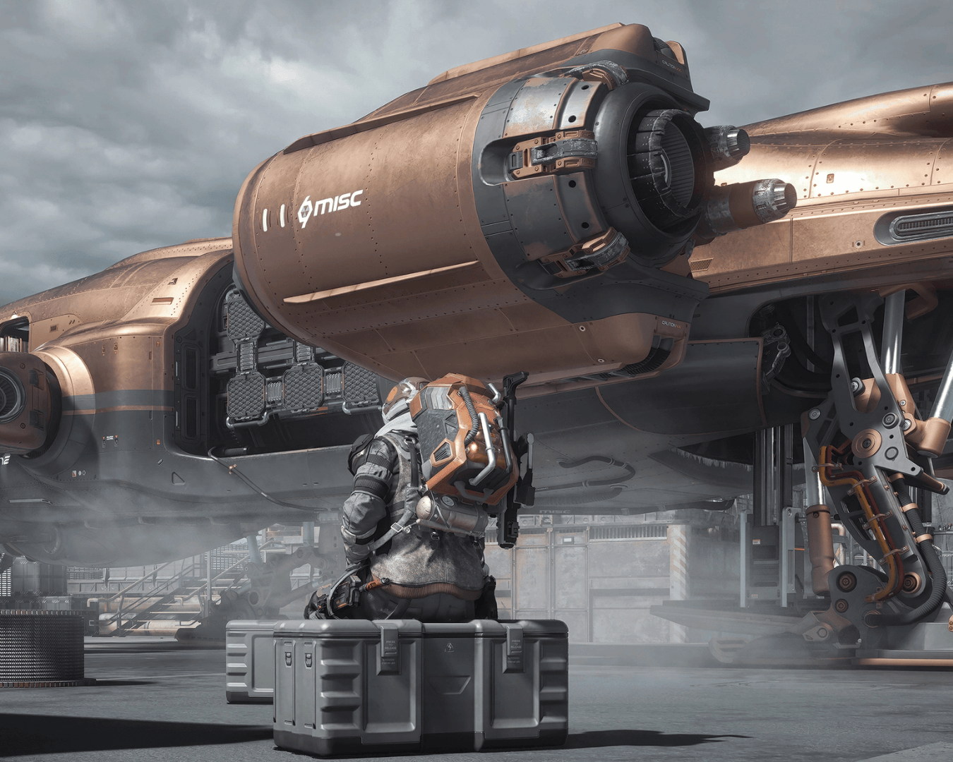 A man sitting beside his misc fortune waiting for the next salvage run orders.